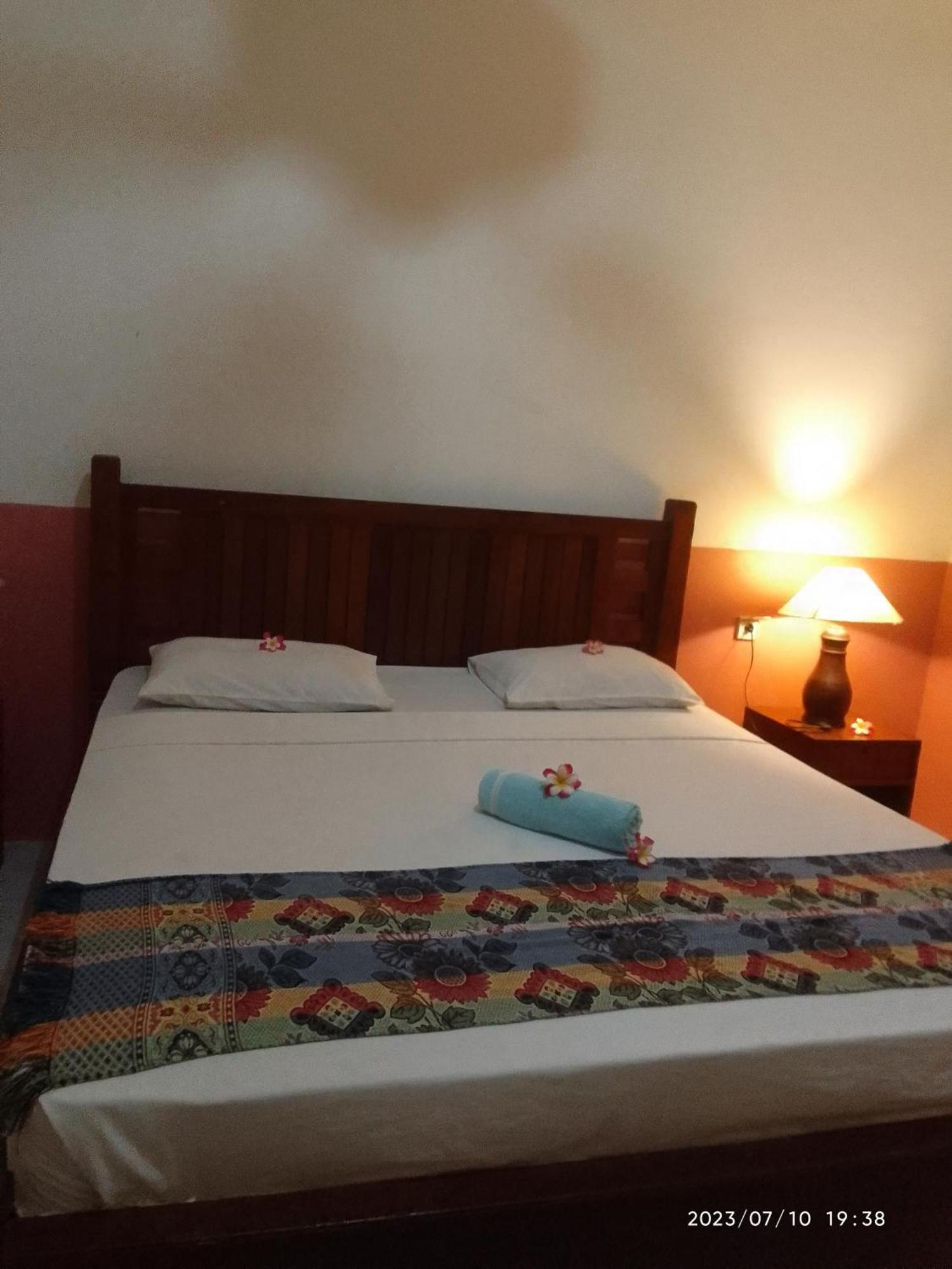 Kputra Homestay Amed Szoba fotó