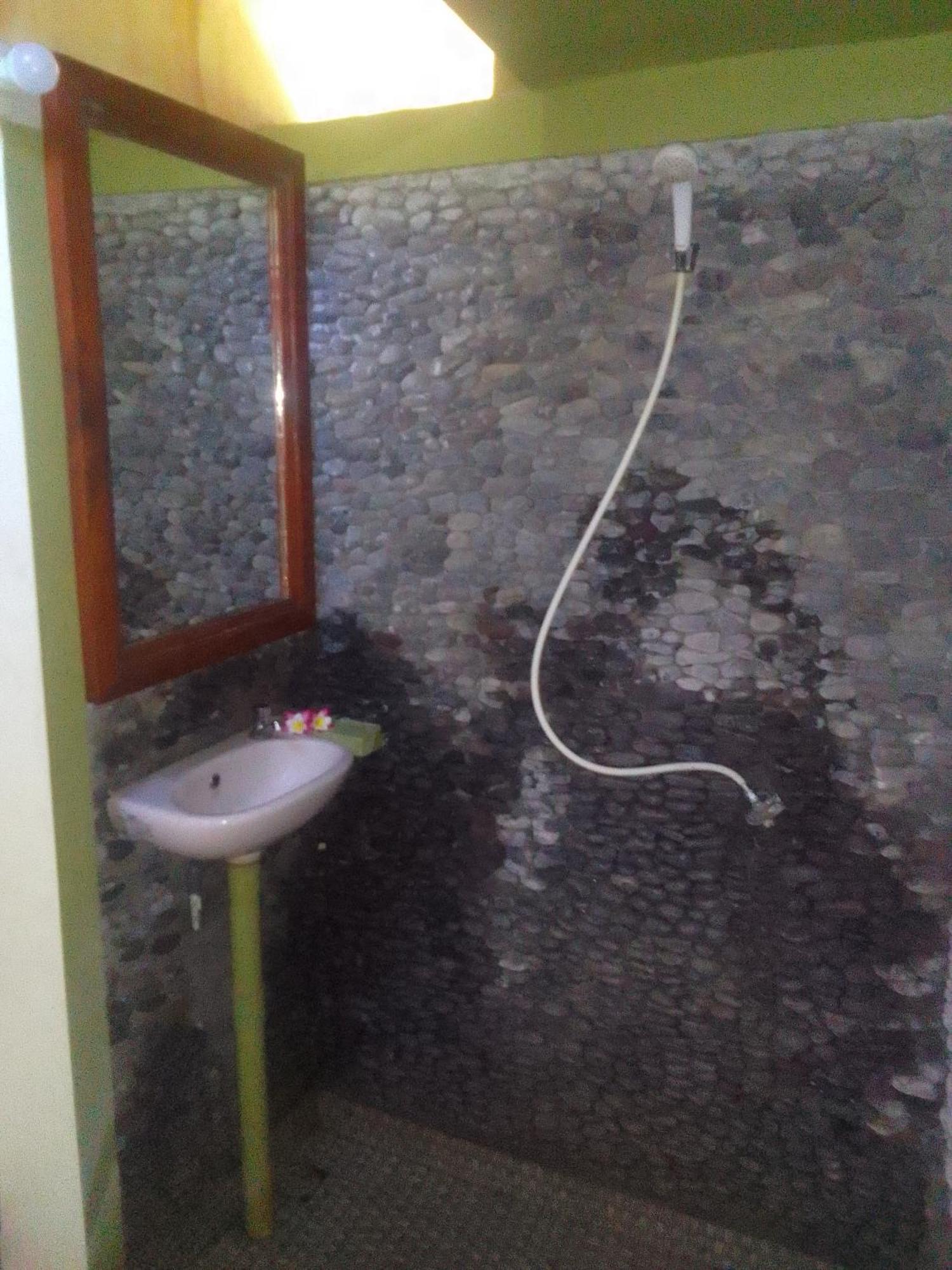 Kputra Homestay Amed Szoba fotó