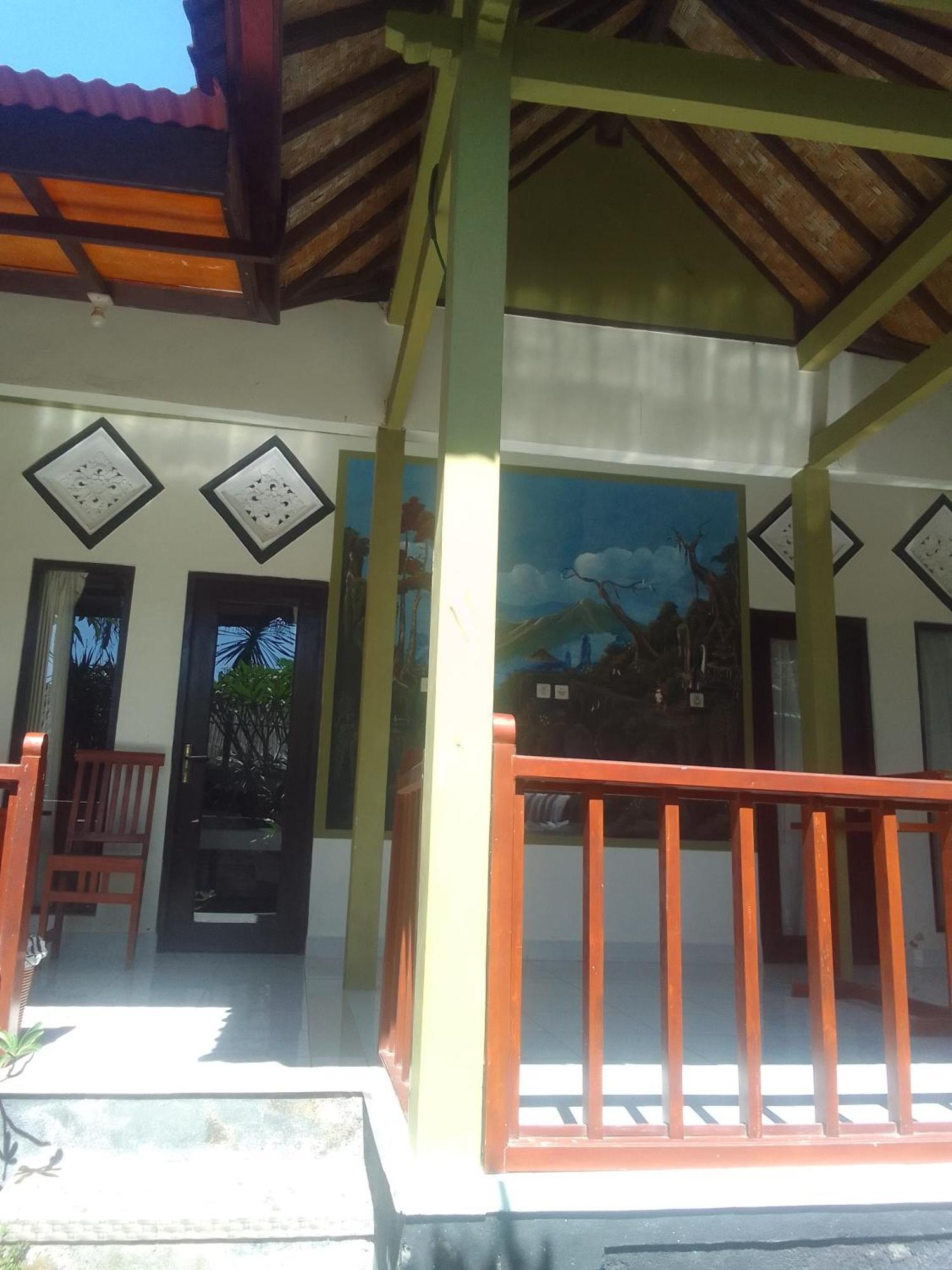 Kputra Homestay Amed Szoba fotó